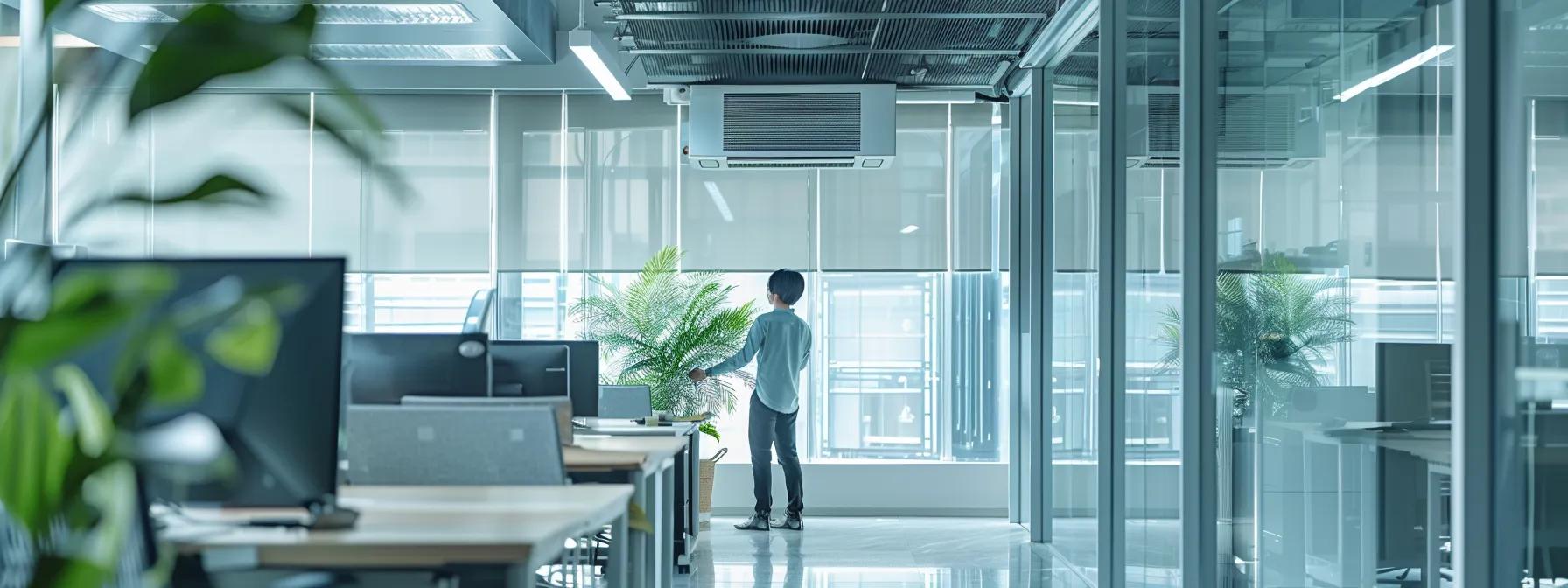 a modern office scene captures a focused hvac professional poring over a detailed blueprint and permitting documents, surrounded by technical equipment and regulatory guidelines, emphasizing the importance of compliance in system installation.
