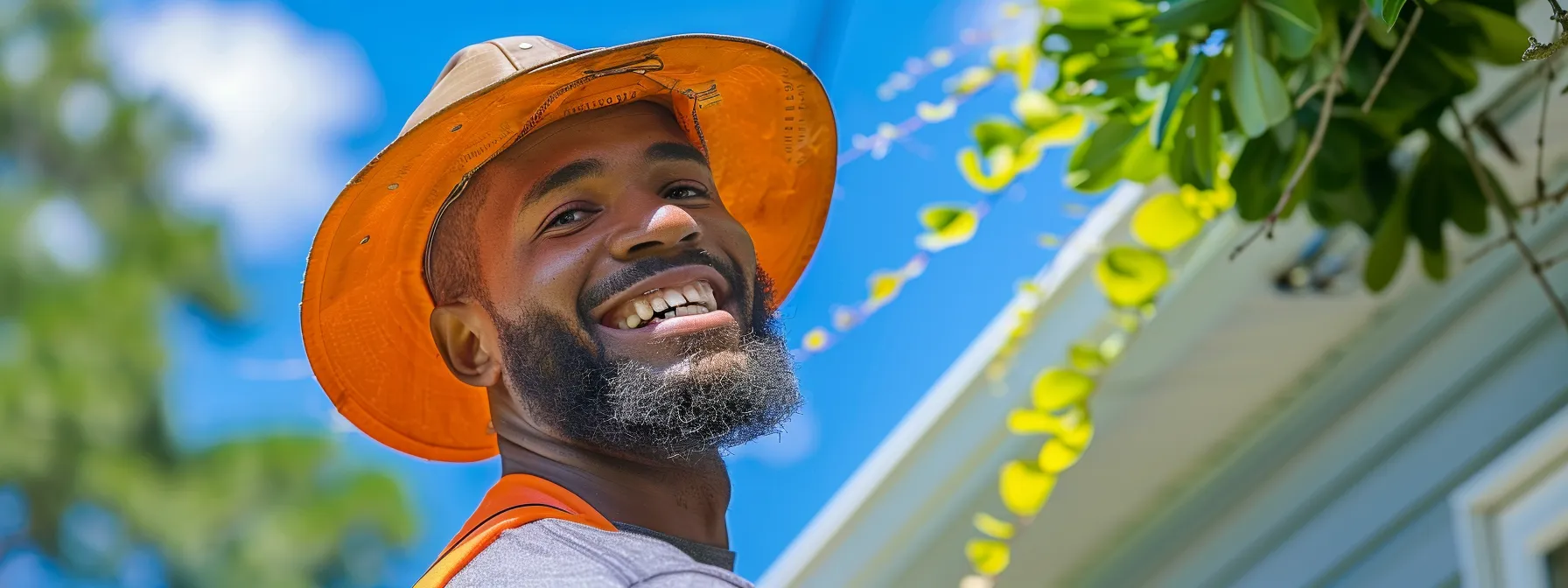 a professional with a bright smile cleaning a duct in a pristine savannah, ga home, surrounded by clear blue skies and lush greenery to showcase the benefits of regular duct cleaning.